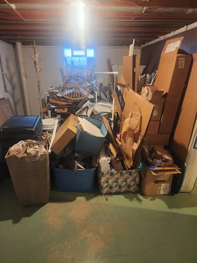 Roll-off dumpster container at job site for 2 Yard Dumpster Rental in Carl Junction